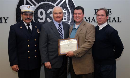 At Monmouth County Firefighter 1 Class 93 graduation were Fire Marshal Henry Stryker, Freeholder Deputy Director John P. Curley, Fitzpatrick award winner Daniel O'Leary and Steve Fitzpatrick.